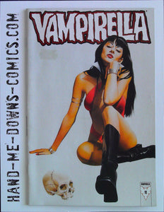 Vampirella 11 - 2002 - Harris Comics - Fine/Very Fine  Price Sticker damage  Cover by Mike Mayhew. Girl Sitting by a Skull cover. Written by John Smith, art by Mike Mayhew. Cover price $2.99.